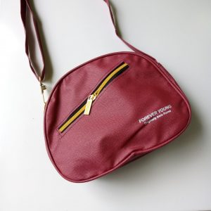 ini adalah Tas Ferel Marun, size: Diameter 17 cm, material: Sintetis, color: Red maroon, brand: Tas bahu kanor, age_group: all ages, gender: unisex