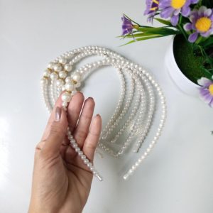 ini adalah Bando Mutiara, size: L, material: pvc, color: white, brand: Bandomutiarakanor, age_group: adult, gender: female